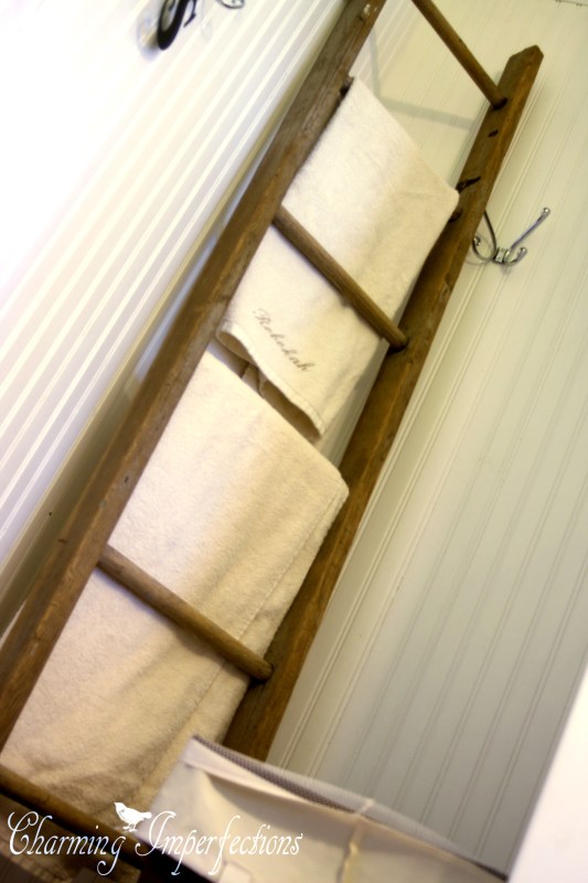 Old ladders convert amazingly into bathroom towel racks.